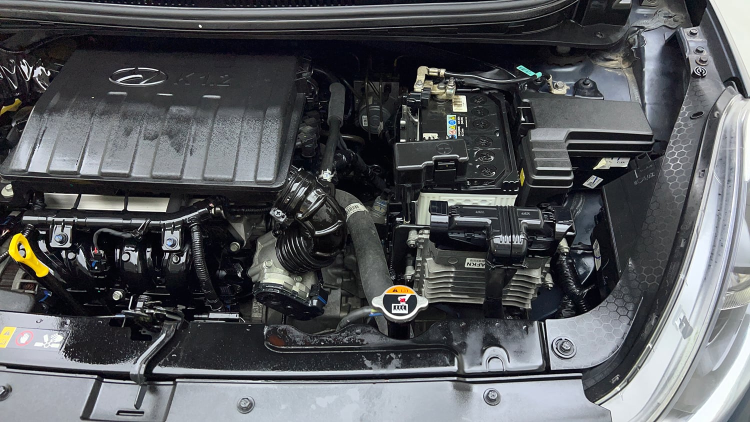Used 2023 Hyundai Grand i10 Nios Sportz AMT 1.2 Kappa VTVT Petrol Automatic engine ENGINE LEFT SIDE VIEW