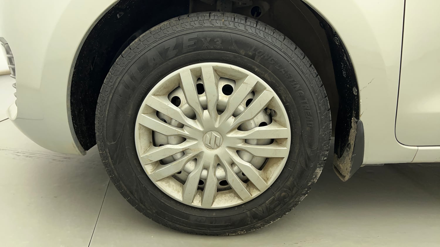 Used 2018 Maruti Suzuki Swift LXi Petrol Manual tyres LEFT FRONT TYRE RIM VIEW