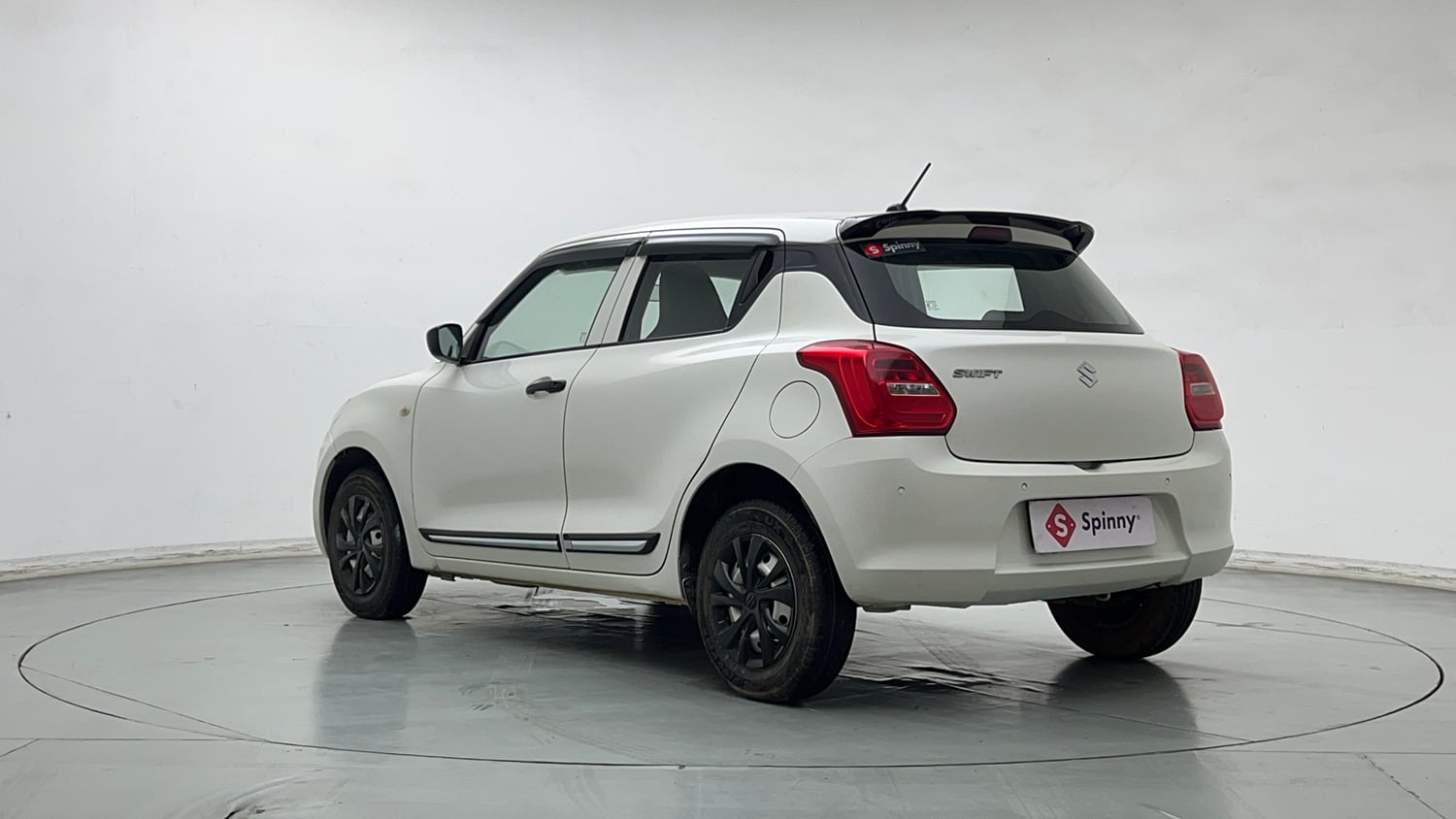 Used 2022 Maruti Suzuki Swift LXi Petrol Manual exterior LEFT REAR CORNER VIEW