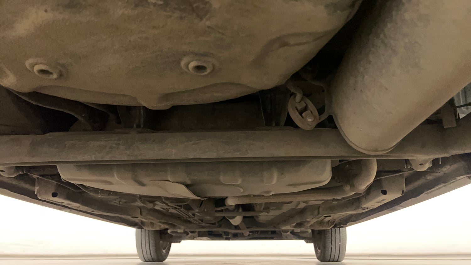 Used 2022 Tata Tigor XZ Plus Petrol Manual extra REAR UNDERBODY VIEW (TAKEN FROM REAR)