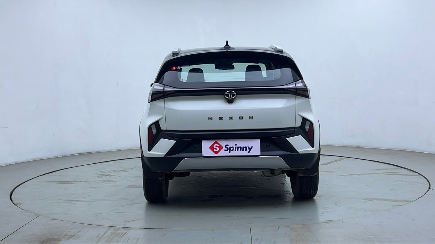 Used 2023 Tata Nexon Fearless Plus S 1.2 Revotron Petrol 7DCA DT Petrol Automatic exterior BACK VIEW