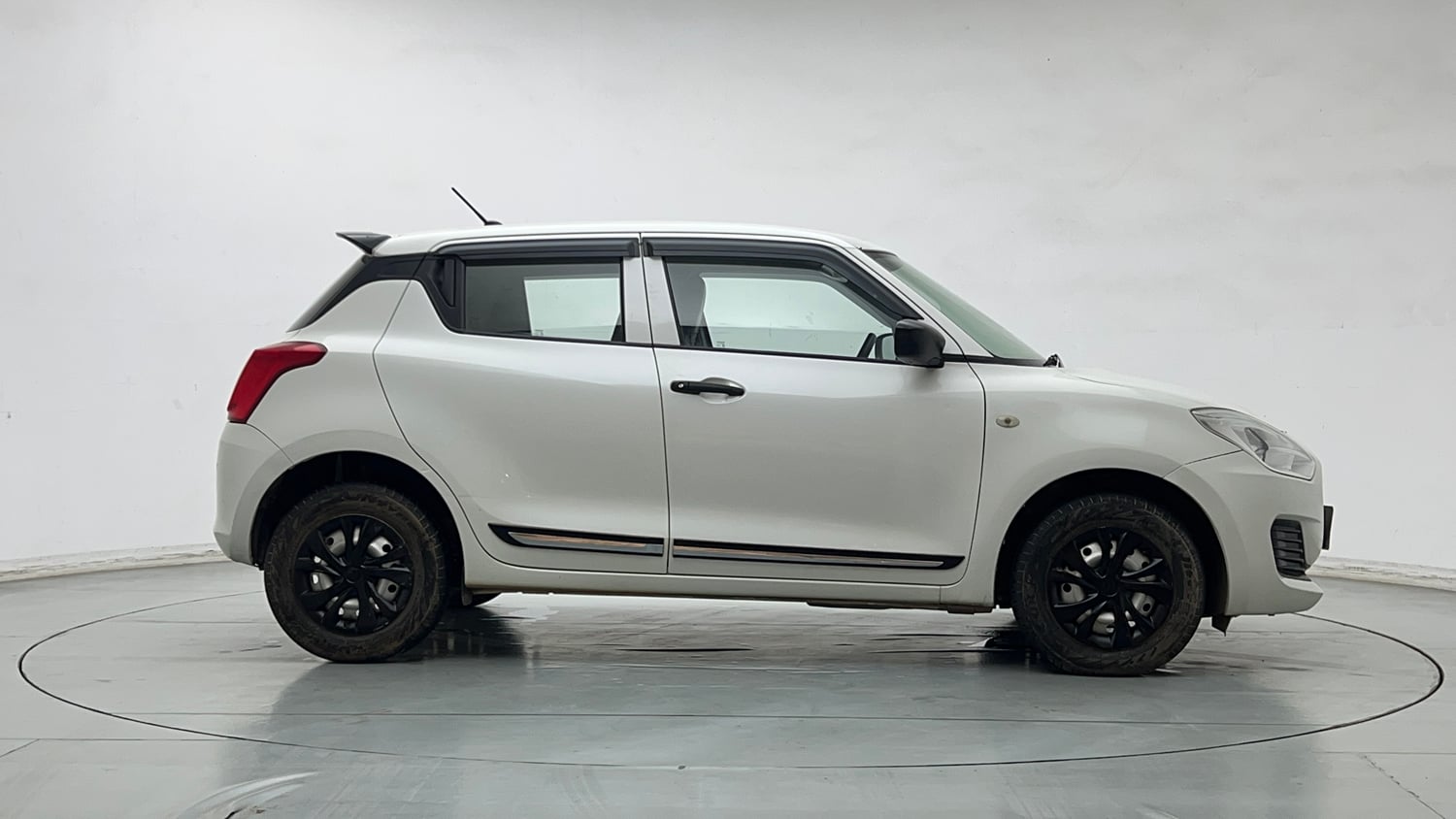 Used 2022 Maruti Suzuki Swift LXi Petrol Manual exterior RIGHT SIDE VIEW
