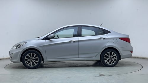 Used 2013 Hyundai Verna Fluidic 1.6 VTVT SX Petrol Manual exterior LEFT SIDE VIEW
