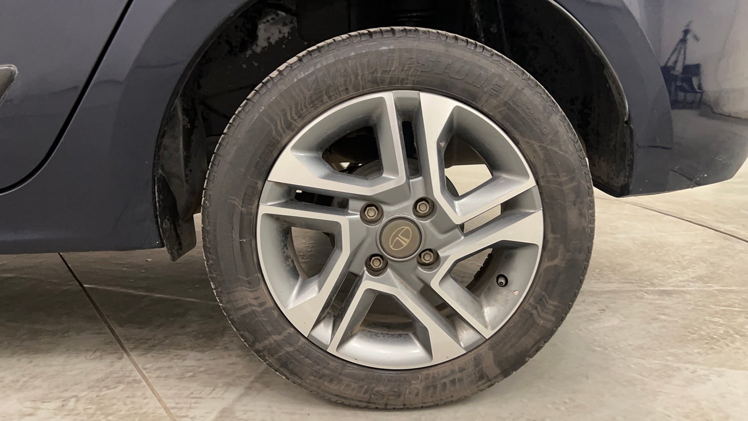 Used 2022 Tata Tigor XZ Plus Petrol Manual tyres LEFT REAR TYRE RIM VIEW