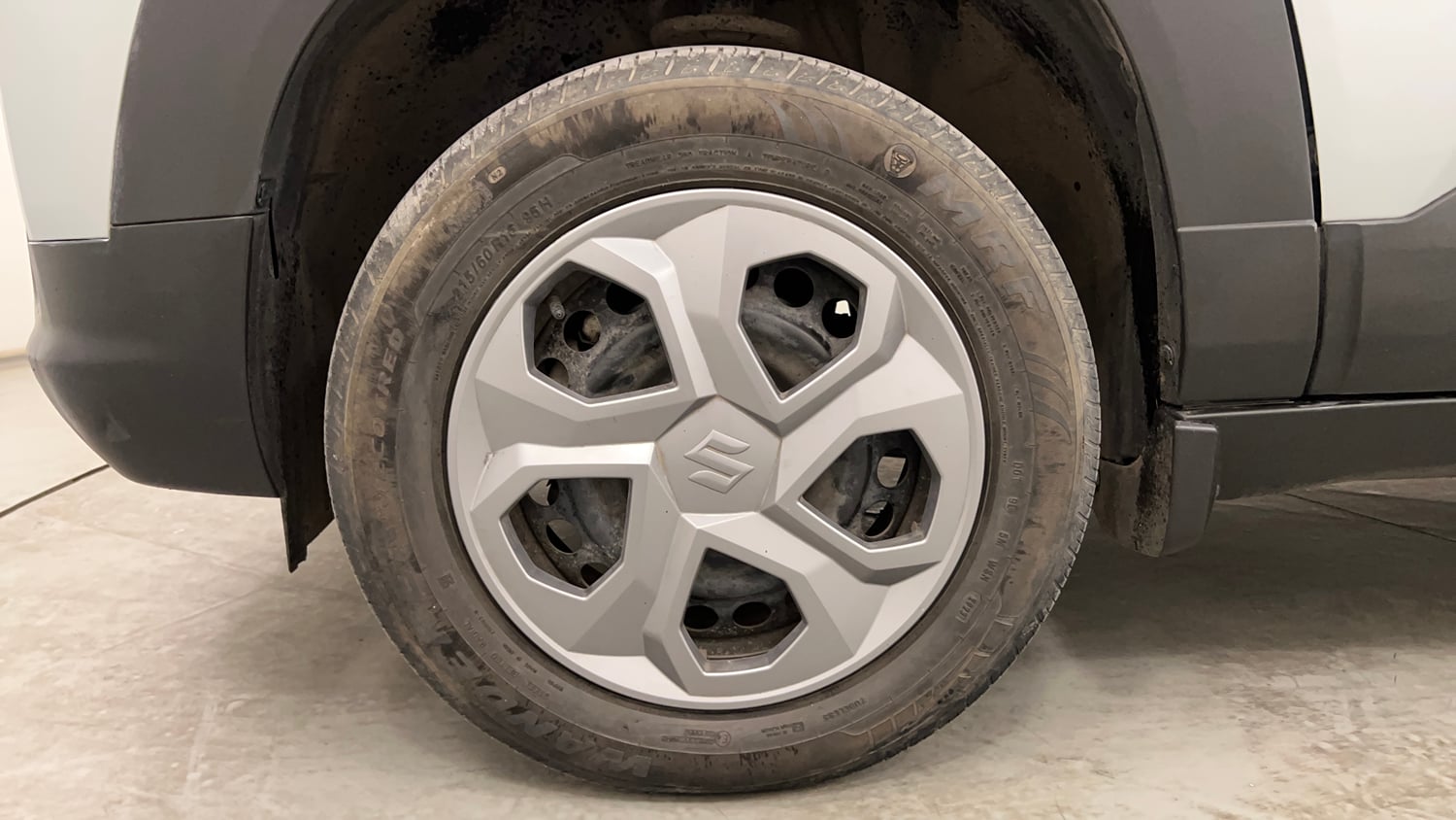 Used 2023 Maruti Suzuki Brezza VXi Petrol Manual tyres LEFT FRONT TYRE RIM VIEW