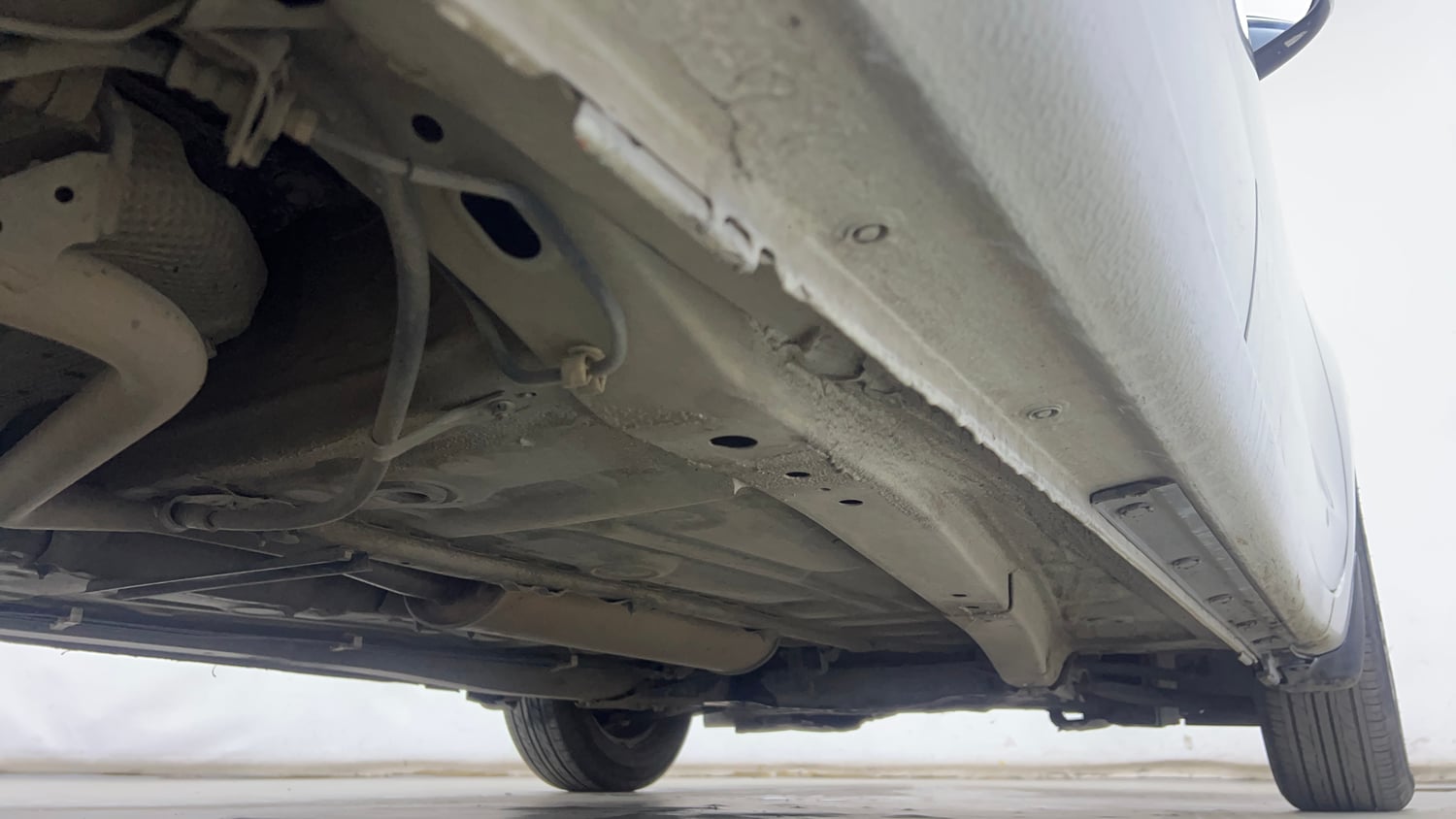 Used 2019 Maruti Suzuki Dzire VXi AMT Petrol Automatic extra REAR RIGHT UNDERBODY VIEW