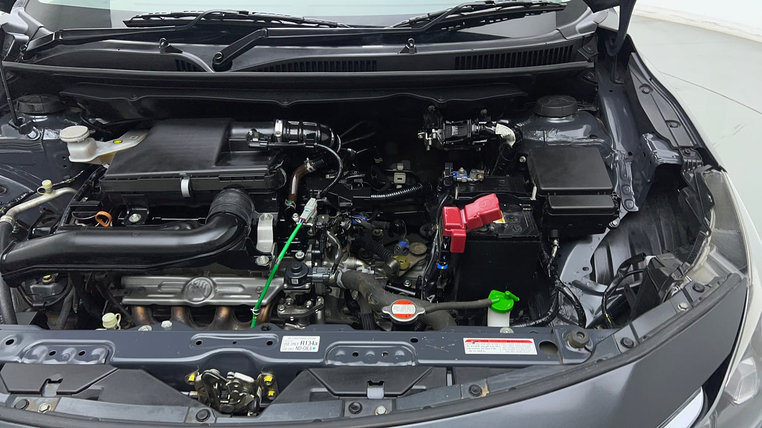 Used 2024 Maruti Suzuki Baleno Zeta MT Petrol Manual engine ENGINE LEFT SIDE VIEW