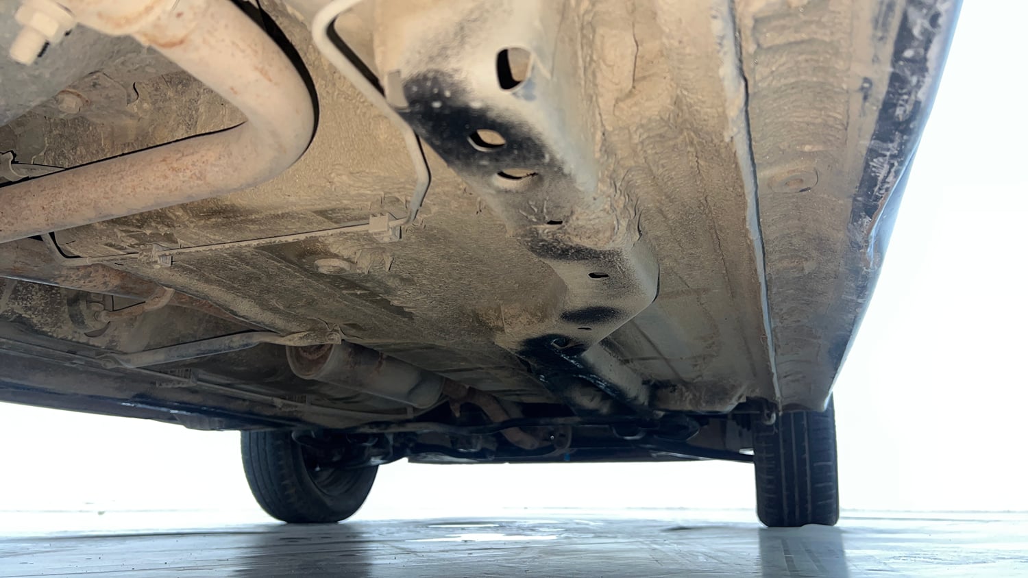 Used 2019 Tata Tiago Revotron XZ w/o Alloy Petrol Manual extra REAR RIGHT UNDERBODY VIEW