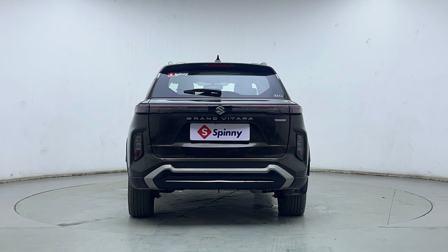 Used 2023 Maruti Suzuki Grand Vitara Alpha Smart Hybrid AT Petrol Automatic exterior BACK VIEW