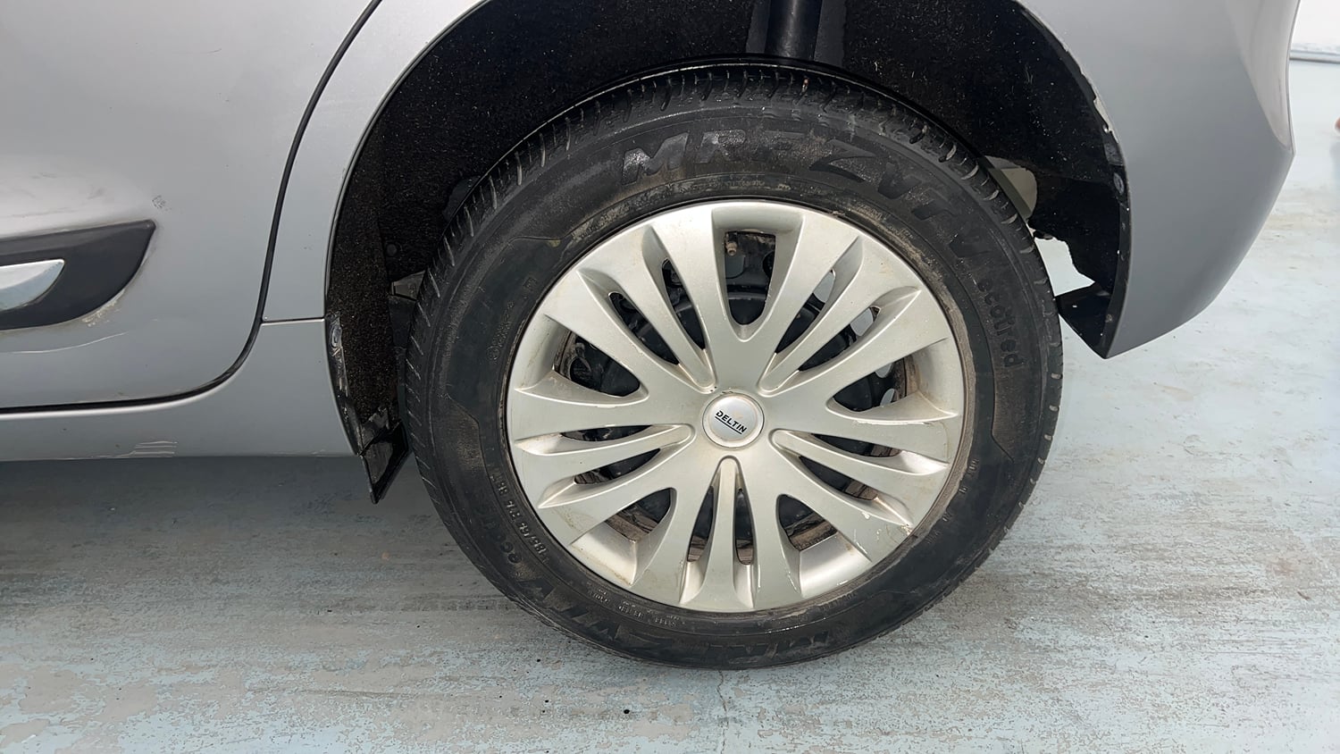 Used 2022 Maruti Suzuki Baleno Delta Petrol Manual tyres LEFT REAR TYRE RIM VIEW