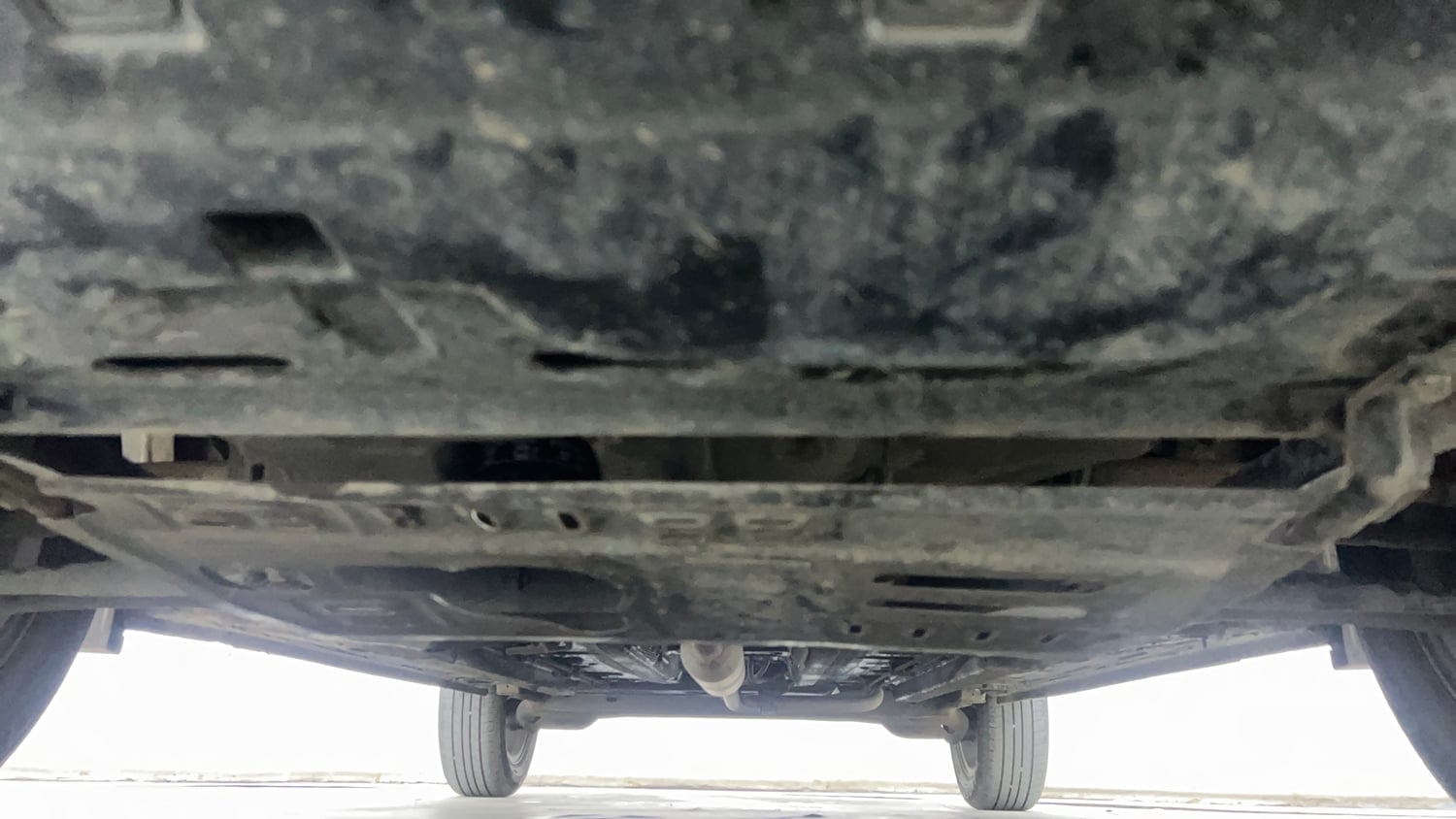 Used 2023 Renault Kiger RXZ AMT Petrol Automatic extra FRONT LEFT UNDERBODY VIEW