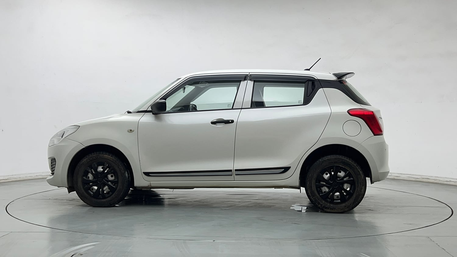Used 2022 Maruti Suzuki Swift LXi Petrol Manual exterior LEFT SIDE VIEW