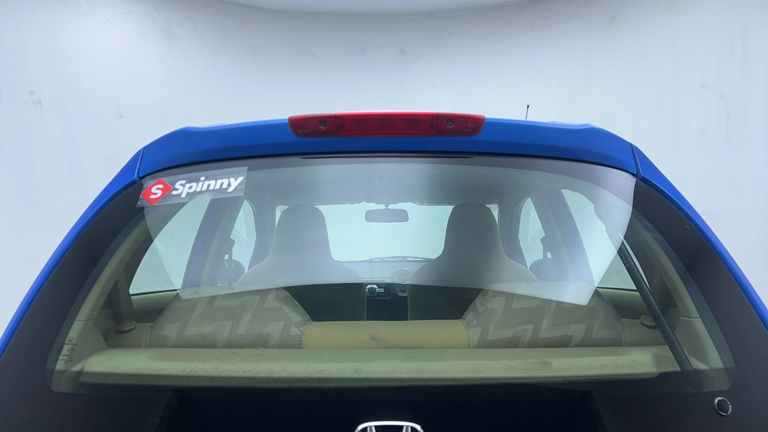 Used 2013 Honda Brio S MT Petrol Manual exterior BACK WINDSHIELD VIEW