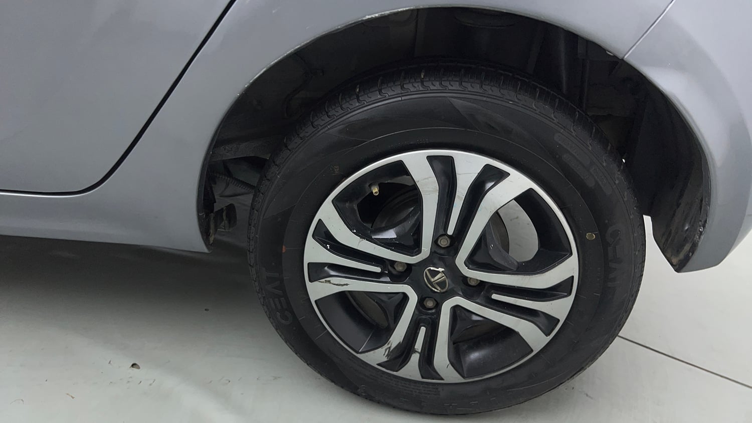 Used 2019 Tata Tiago Revotron XZ w/o Alloy Petrol Manual tyres LEFT REAR TYRE RIM VIEW