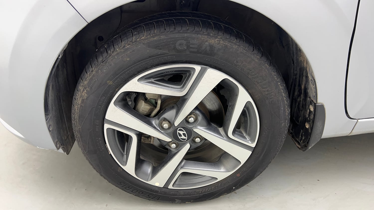Used 2020 Hyundai Aura SX 1.2 Petrol Petrol Manual tyres LEFT FRONT TYRE RIM VIEW