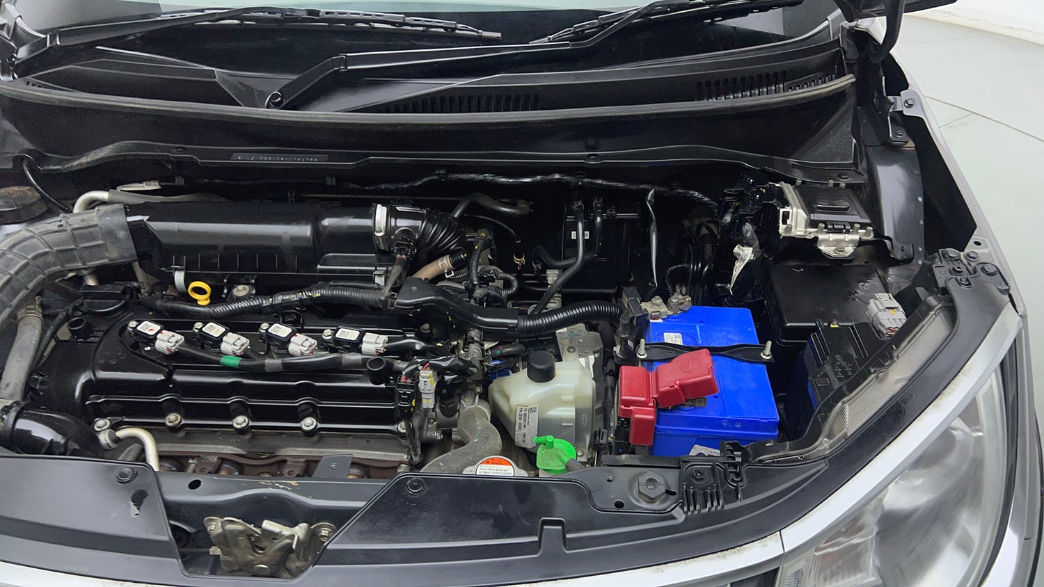 Used 2023 Maruti Suzuki Ignis Alpha 1.2 AMT Petrol Automatic engine ENGINE LEFT SIDE VIEW