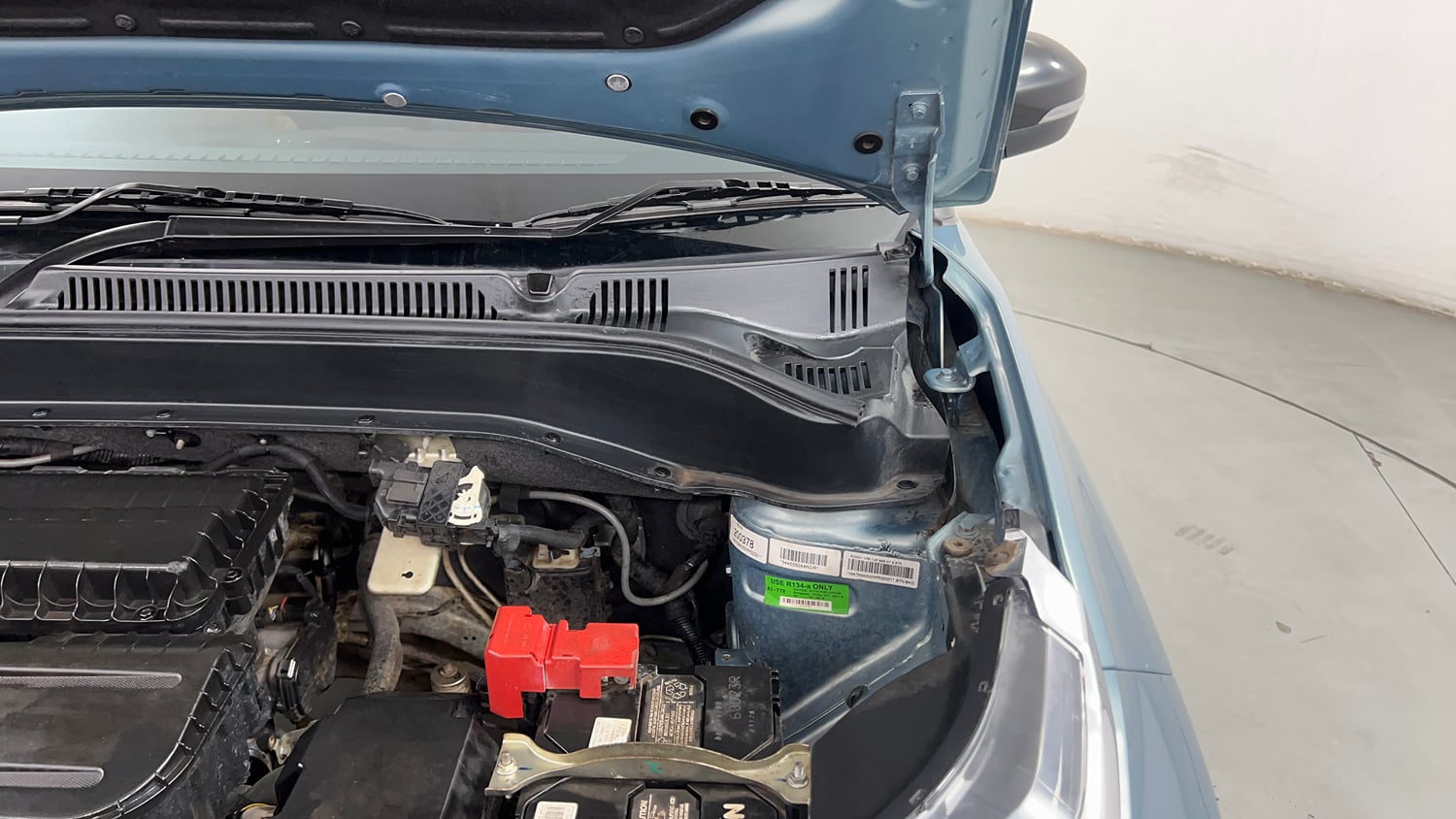Used 2023 Tata Punch Creative Dual Tone Petrol Manual engine ENGINE LEFT SIDE HINGE & APRON VIEW