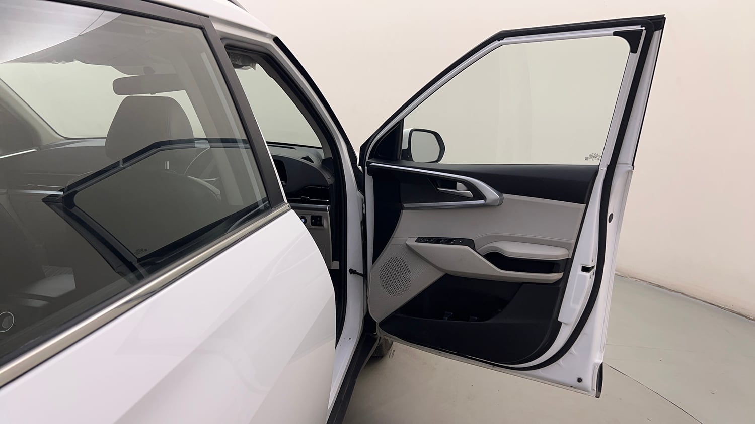 Used 2022 Kia Carens Prestige Plus 1.4 Petrol MT 7 STR Petrol Manual interior RIGHT FRONT DOOR OPEN VIEW