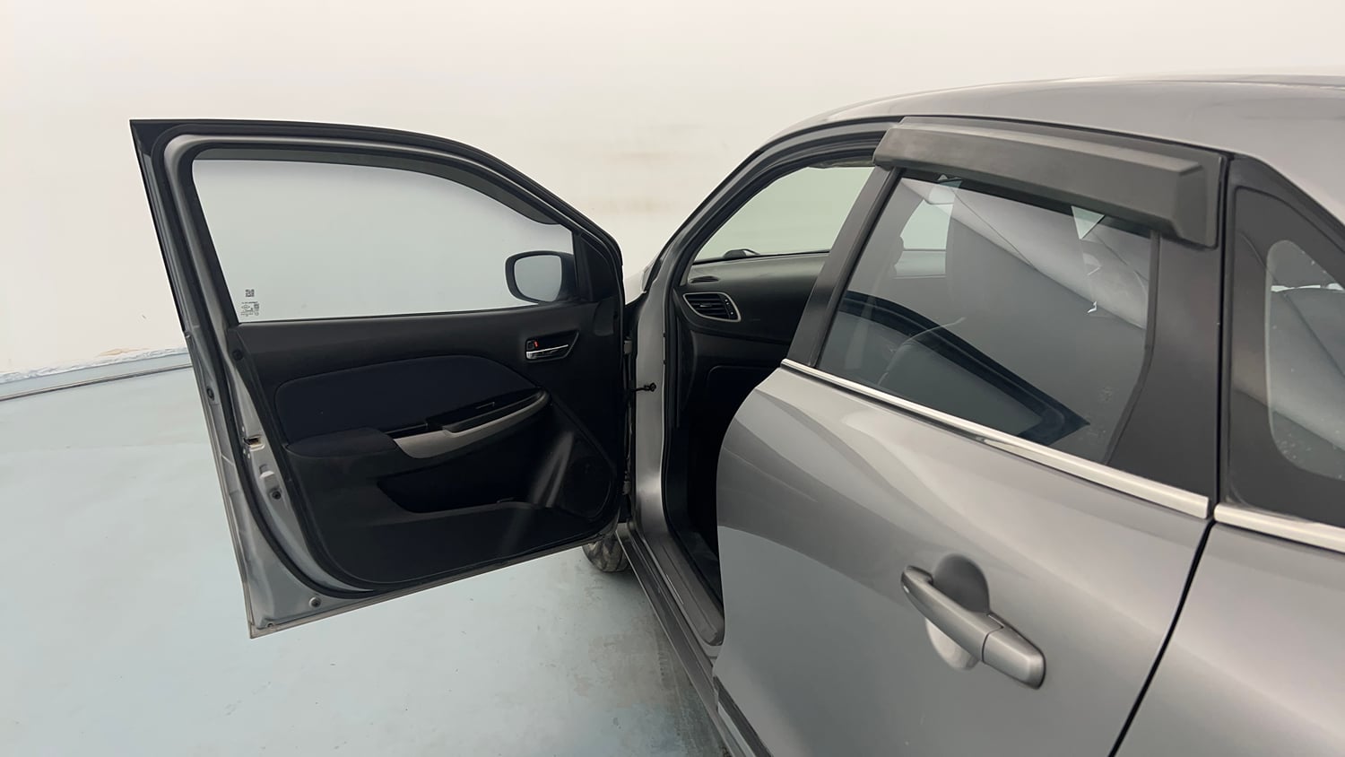 Used 2022 Maruti Suzuki Baleno Delta Petrol Manual interior LEFT FRONT DOOR OPEN VIEW