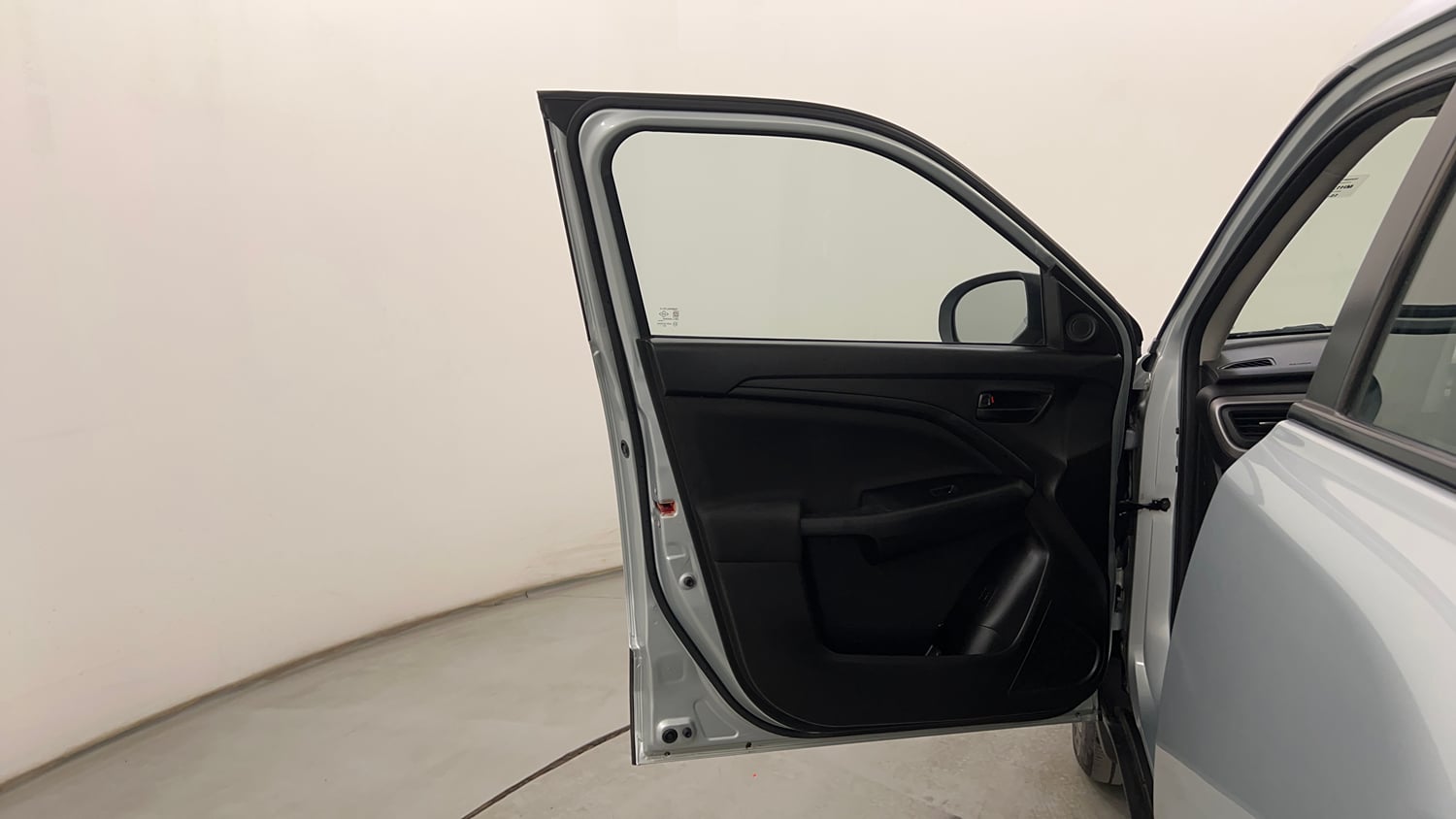 Used 2023 Maruti Suzuki Brezza VXi Petrol Manual interior LEFT FRONT DOOR OPEN VIEW