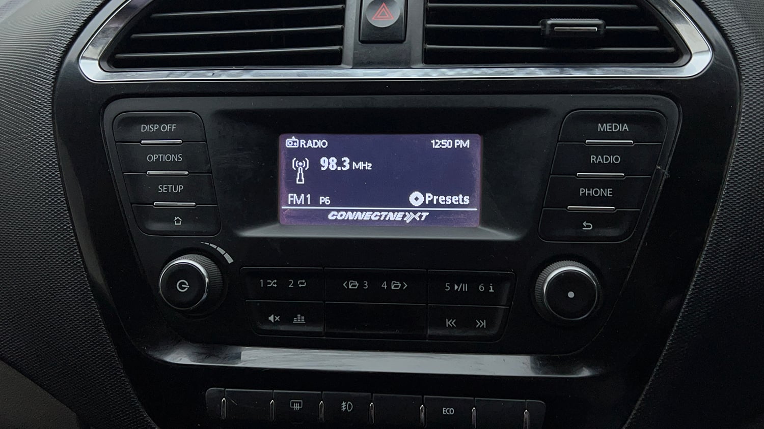 Used 2018 Tata Tiago Revotron XZ Petrol Manual top_features Integrated (in-dash) music system