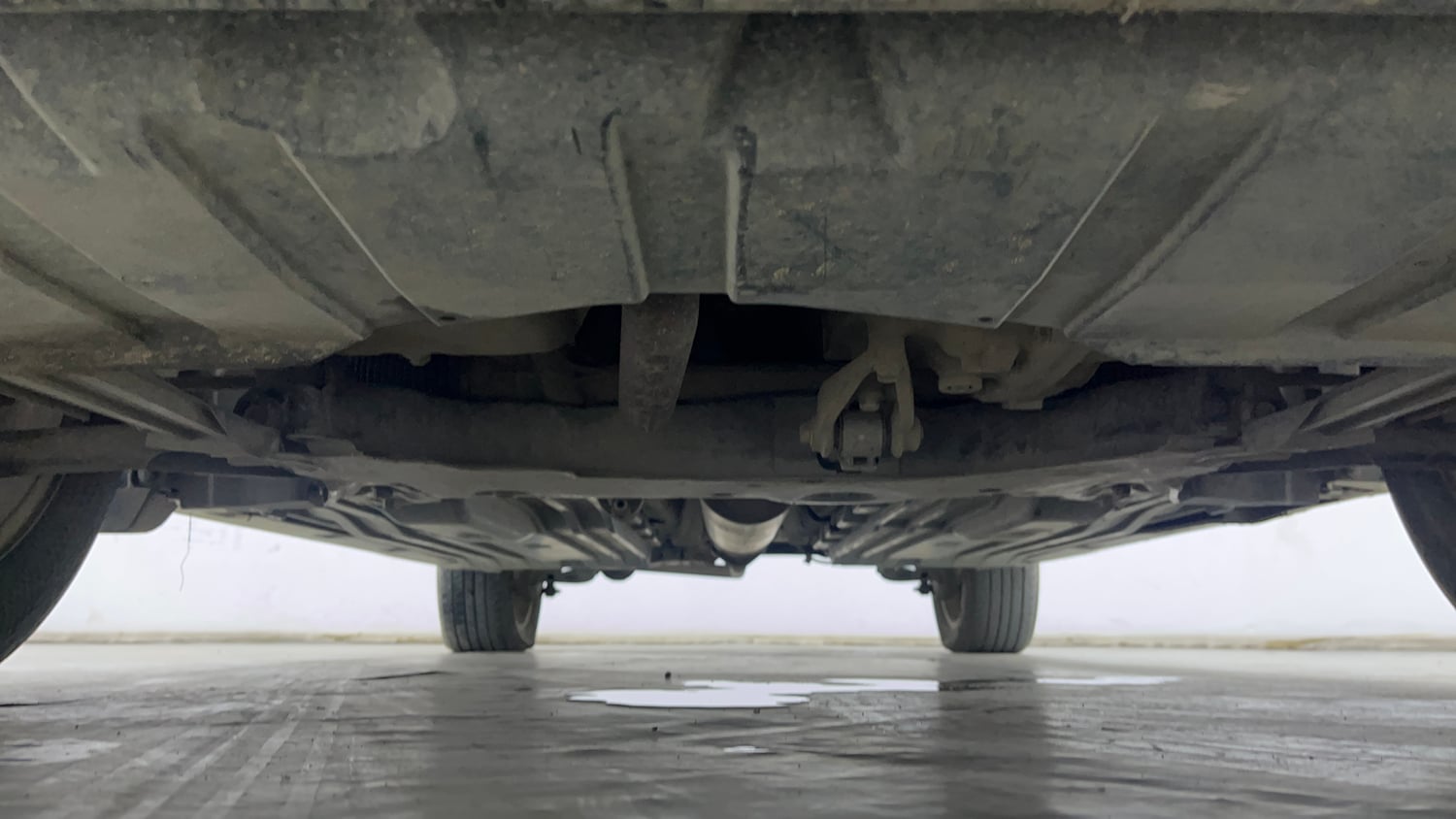 Used 2023 Maruti Suzuki Grand Vitara Alpha Smart Hybrid AT Petrol Automatic extra FRONT LEFT UNDERBODY VIEW
