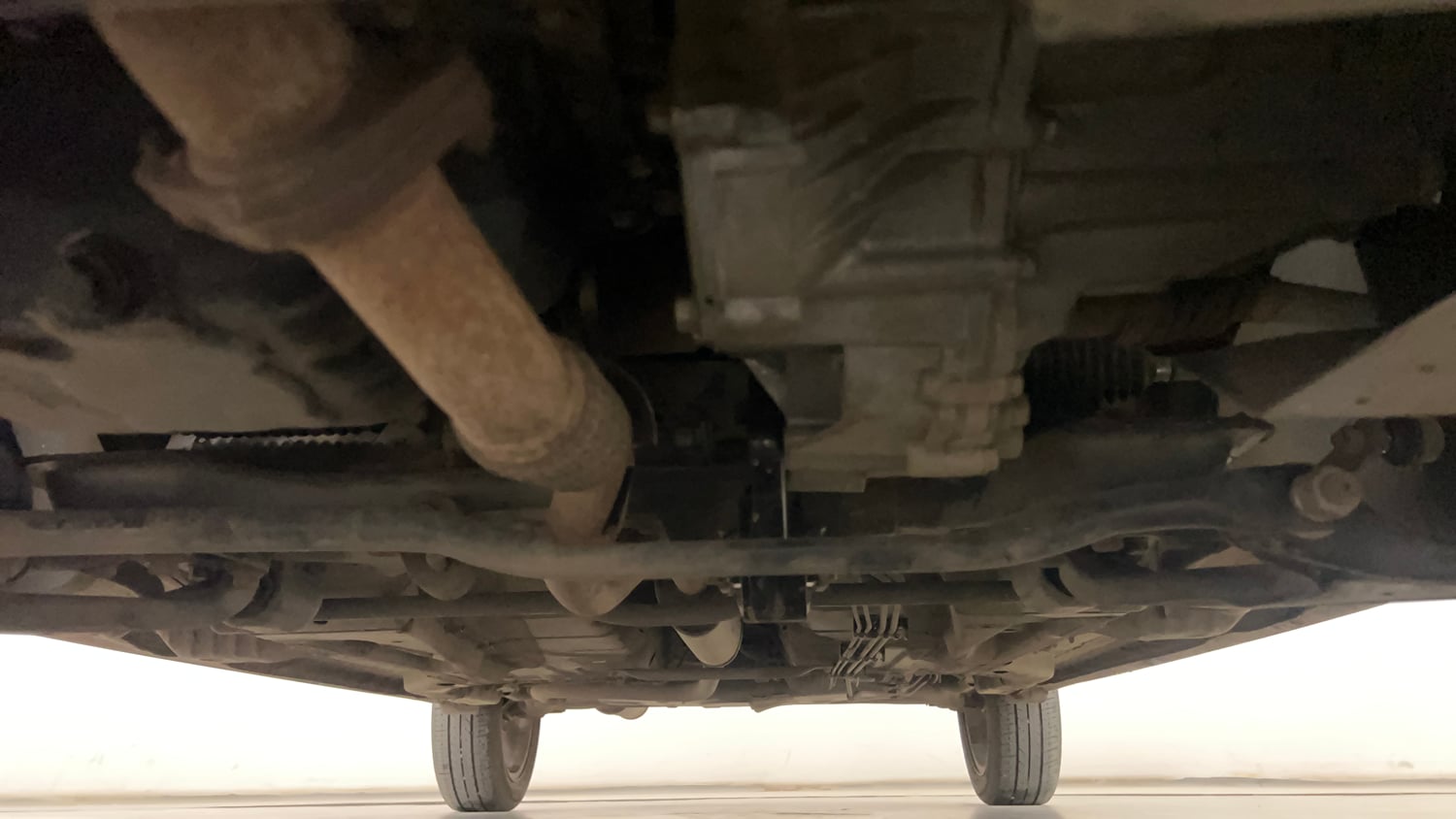Used 2022 Tata Tigor XZ Plus Petrol Manual extra FRONT LEFT UNDERBODY VIEW