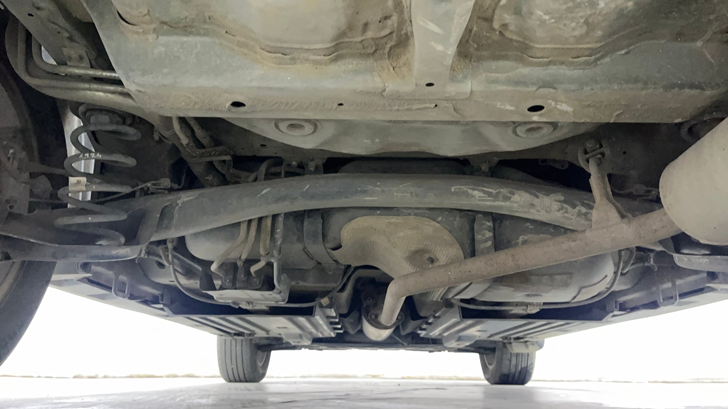 Used 2023 Maruti Suzuki Grand Vitara Alpha Smart Hybrid AT Petrol Automatic extra REAR UNDERBODY VIEW (TAKEN FROM REAR)