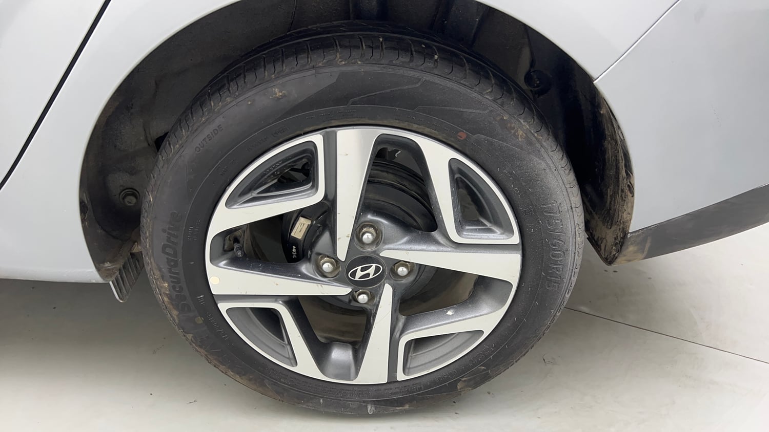 Used 2020 Hyundai Aura SX 1.2 Petrol Petrol Manual tyres LEFT REAR TYRE RIM VIEW