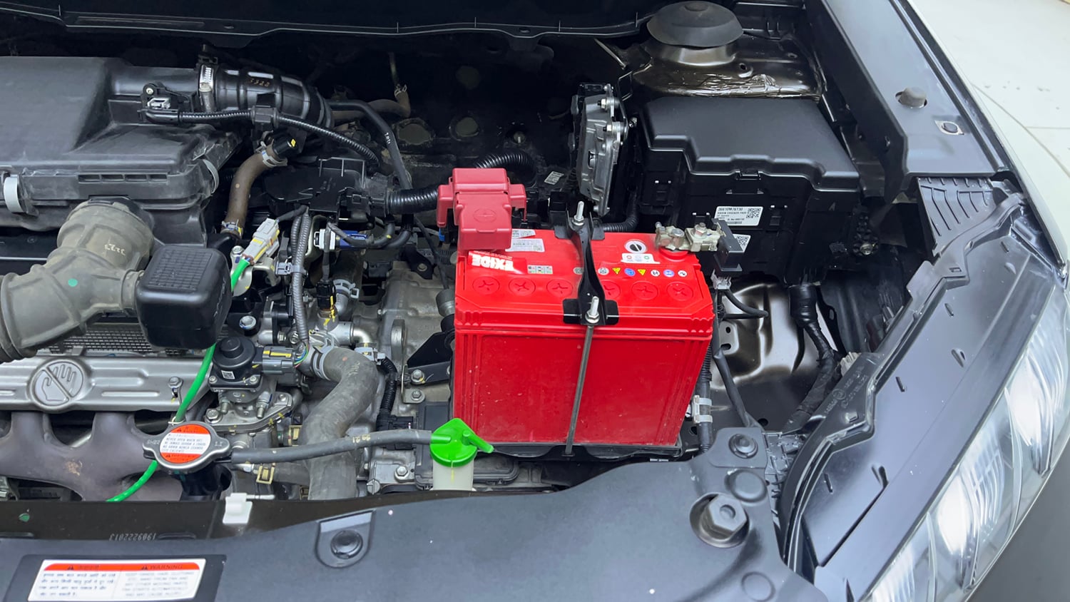 Used 2023 Maruti Suzuki Grand Vitara Alpha Smart Hybrid AT Petrol Automatic engine ENGINE LEFT SIDE VIEW