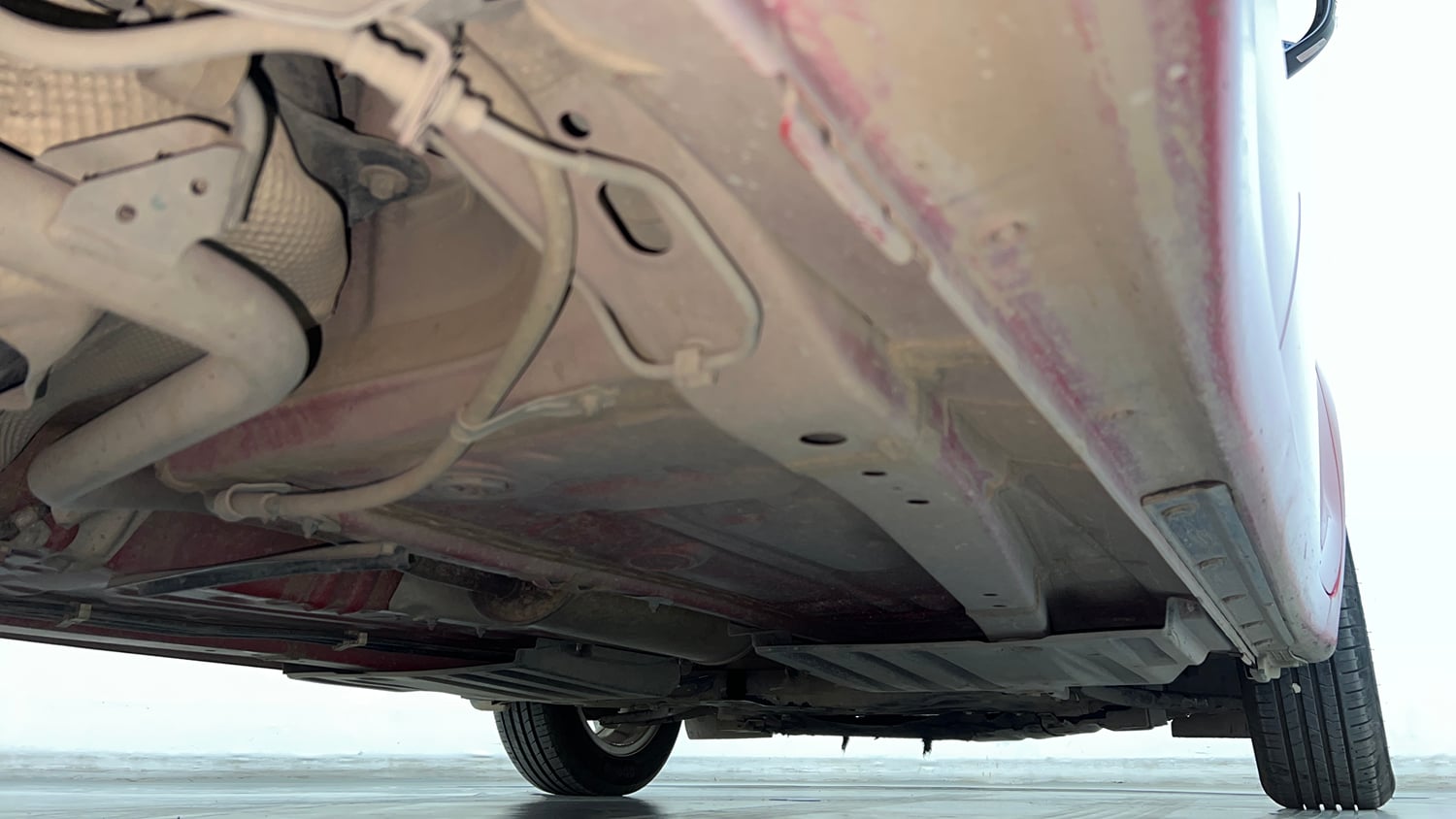 Used 2022 Maruti Suzuki Swift ZXi AMT Petrol Automatic extra REAR RIGHT UNDERBODY VIEW