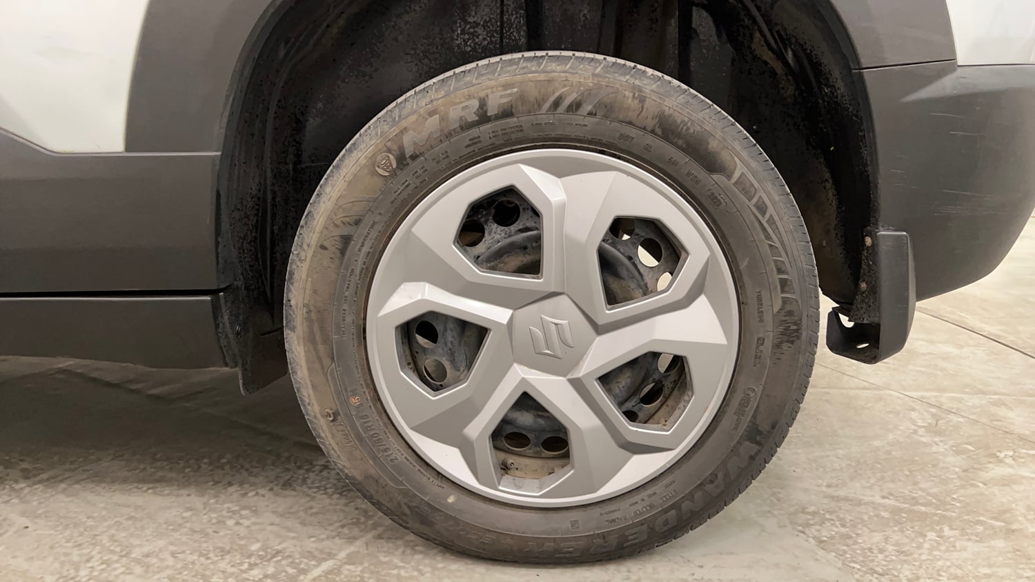 Used 2023 Maruti Suzuki Brezza VXi Petrol Manual tyres LEFT REAR TYRE RIM VIEW