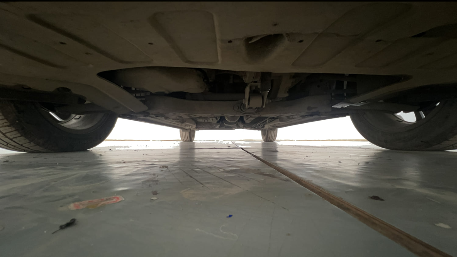 Used 2023 Hyundai i20 Asta 1.2 MT Petrol Manual extra FRONT LEFT UNDERBODY VIEW