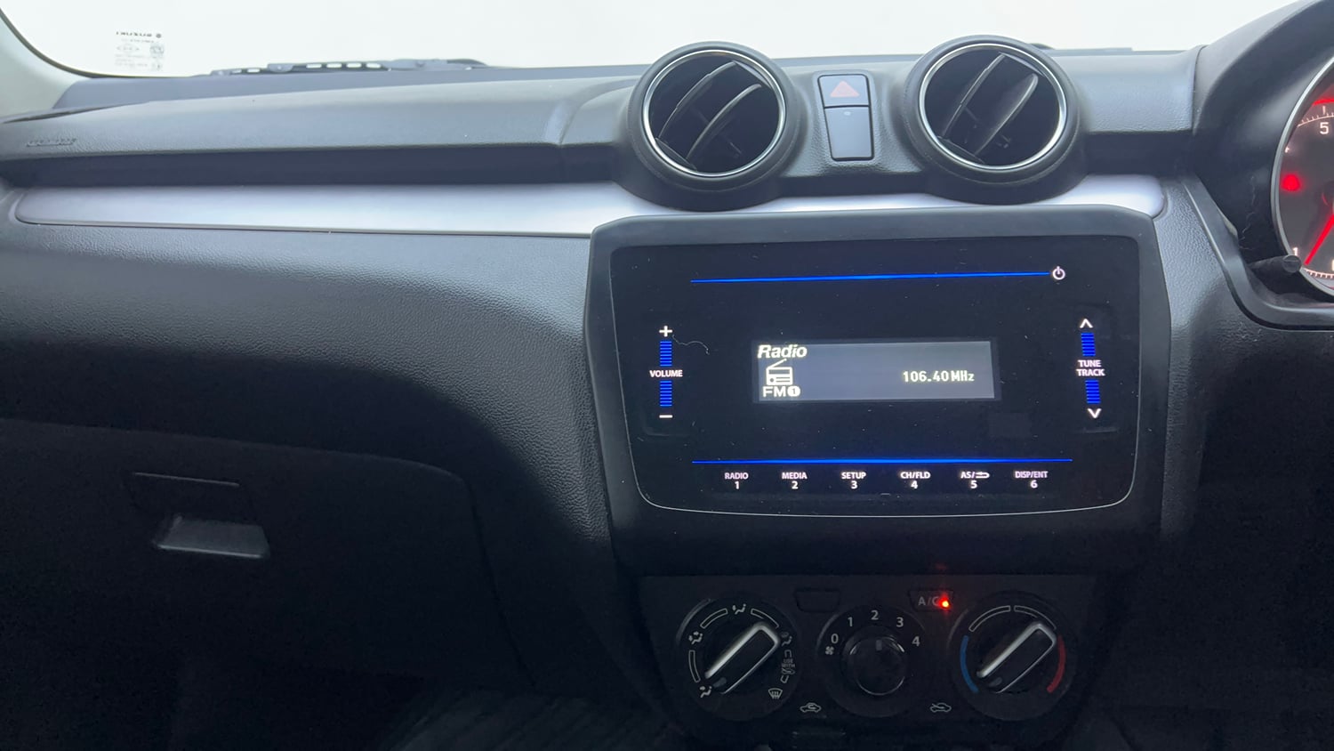 Used 2023 Maruti Suzuki Swift VXi Petrol Manual interior MUSIC SYSTEM & AC CONTROL VIEW