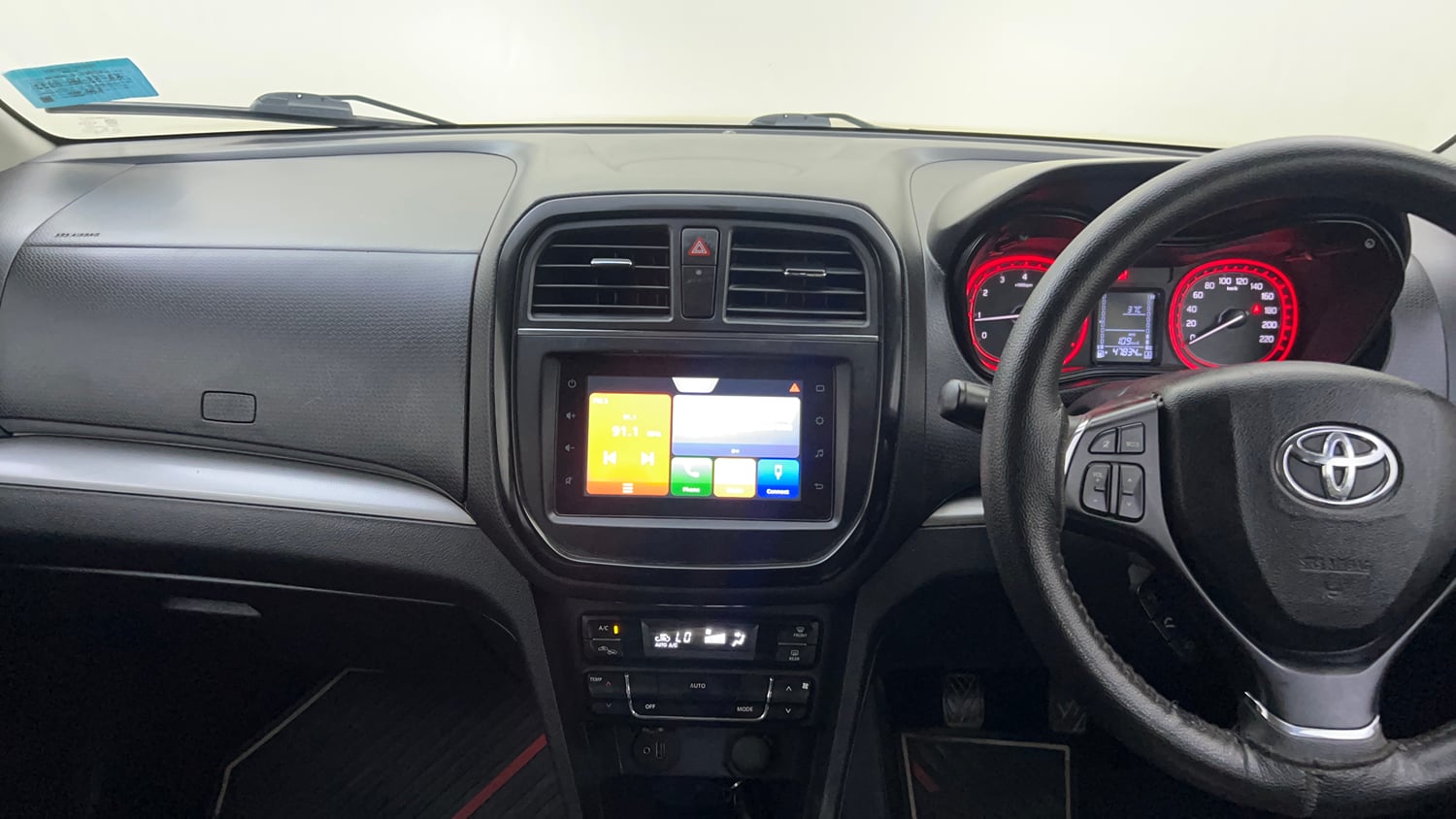 Used 2021 Toyota Urban Cruiser High Grade MT Petrol Manual interior MUSIC SYSTEM & AC CONTROL VIEW