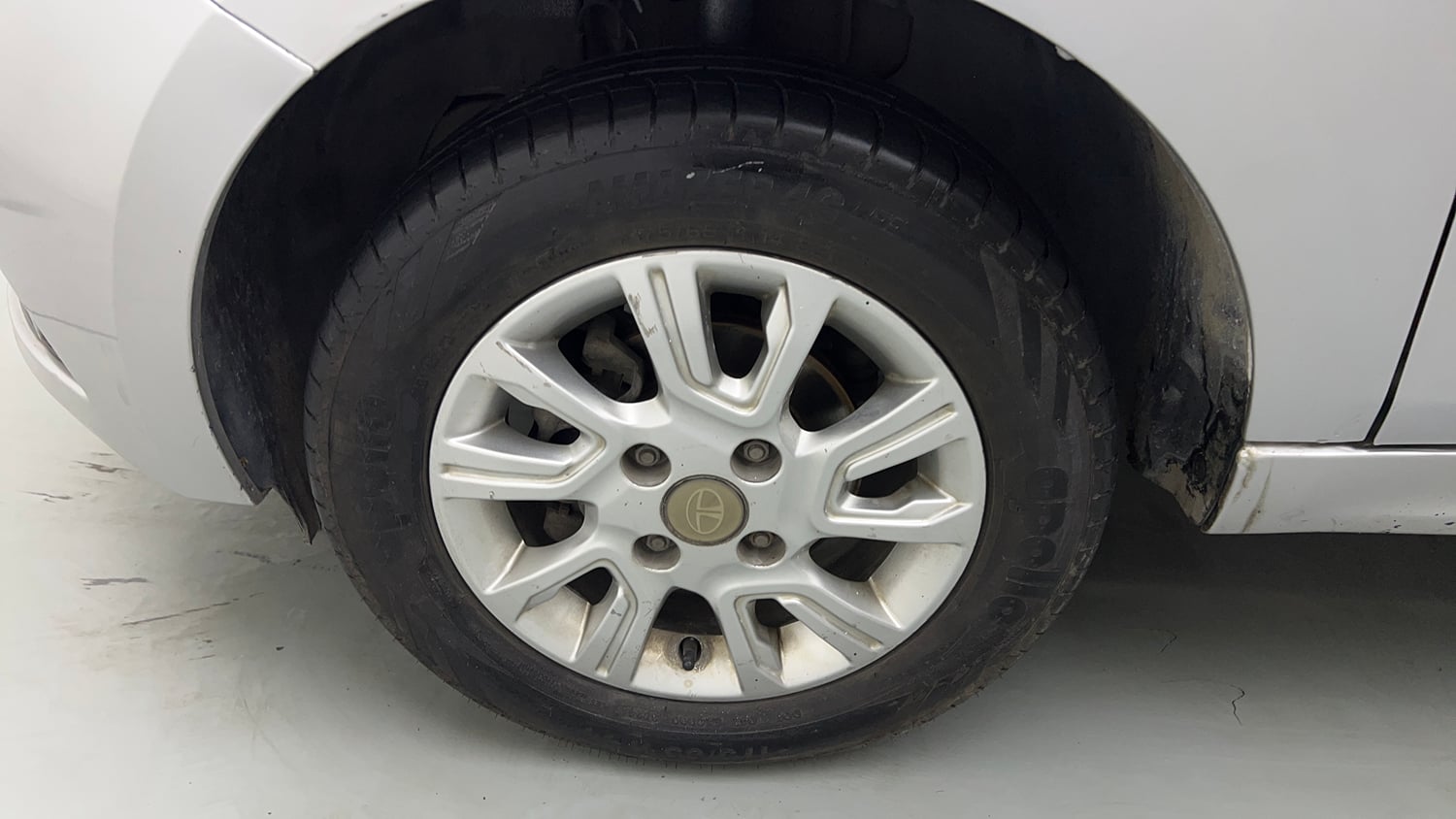 Used 2018 Tata Tiago Revotron XZ Petrol Manual tyres LEFT FRONT TYRE RIM VIEW