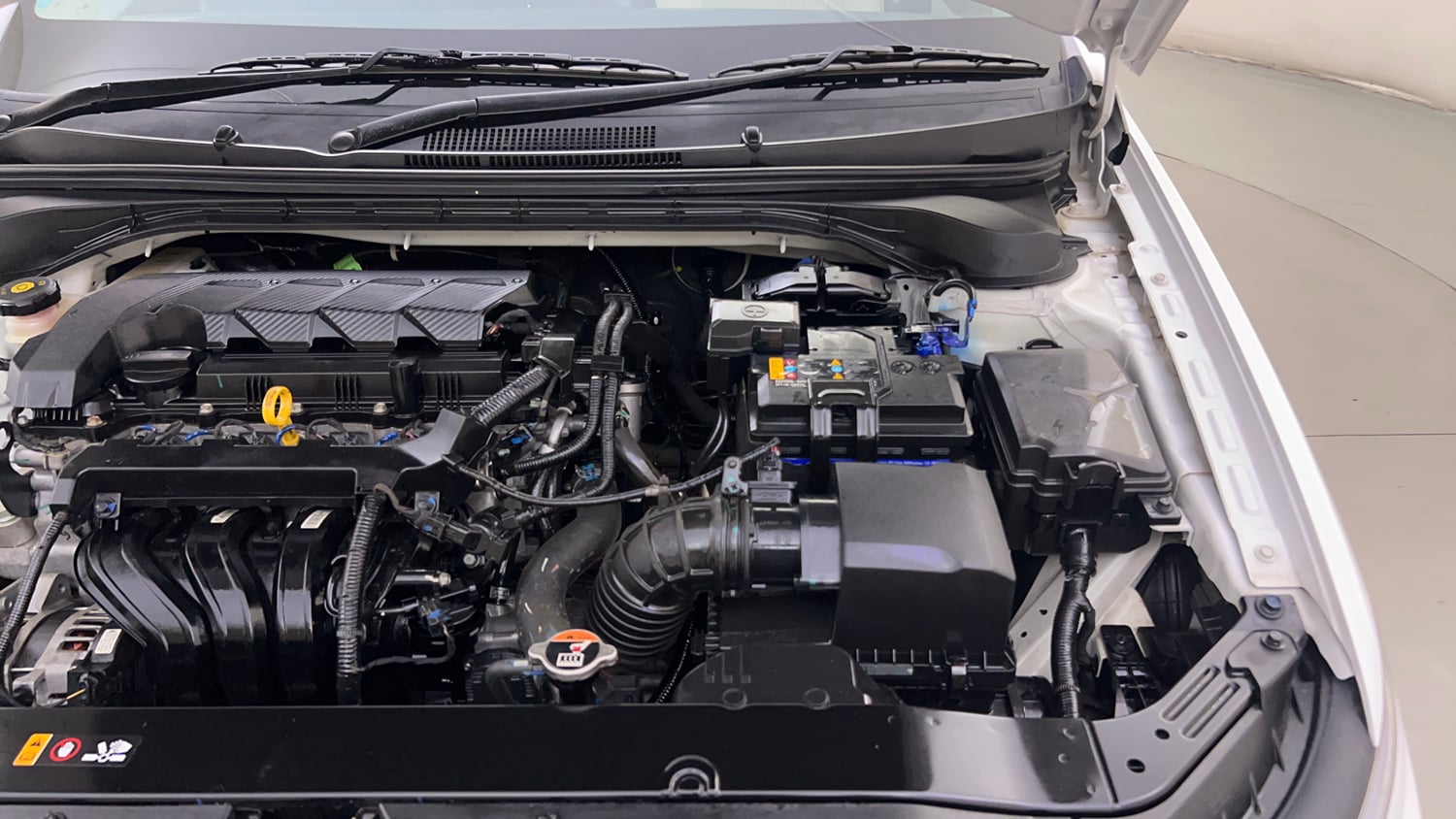 Used 2024 Hyundai Verna SX (O)1.5 Petrol MT Petrol Manual engine ENGINE LEFT SIDE HINGE & APRON VIEW