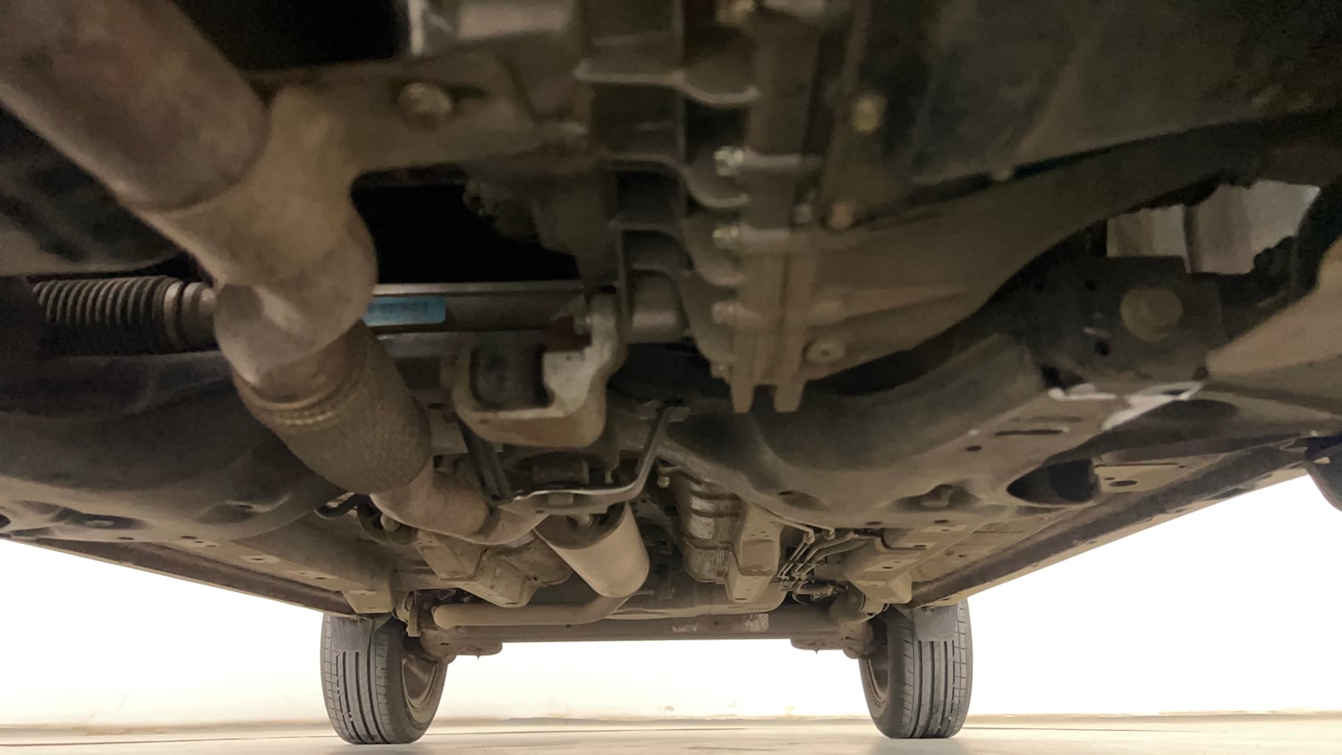 Used 2024 Tata Nexon Creative Plus S 1.2 Revotron Petrol 7DCA Petrol Automatic extra FRONT LEFT UNDERBODY VIEW