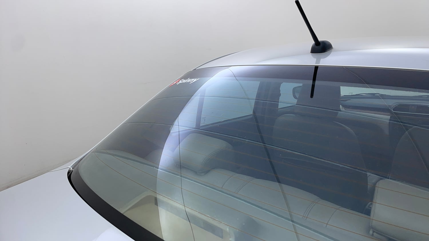 Used 2018 Maruti Suzuki Dzire ZXi Petrol Manual top_features Rear defogger