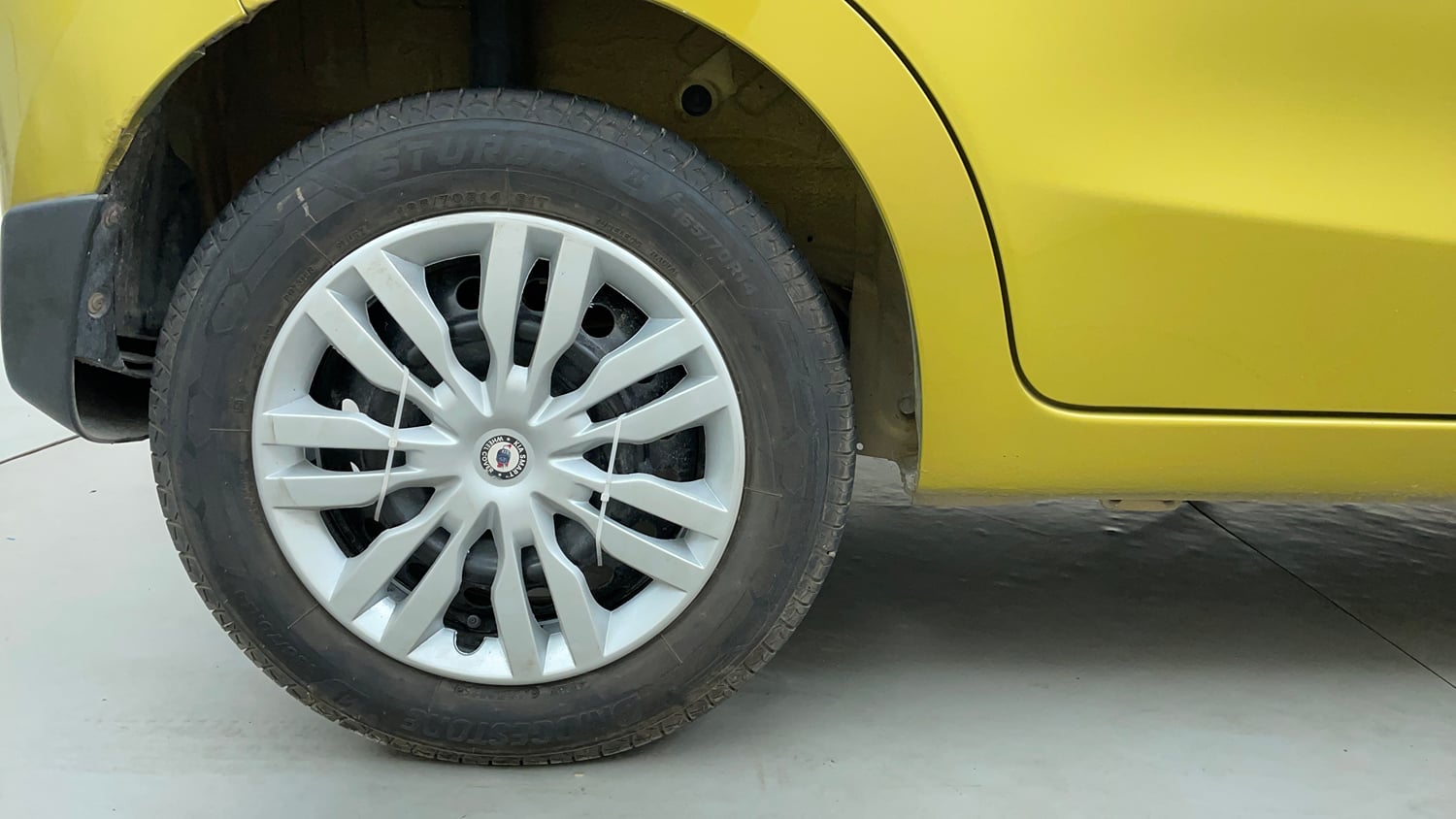 Used 2014 Maruti Suzuki Celerio VXi AMT Petrol Automatic tyres RIGHT REAR TYRE RIM VIEW