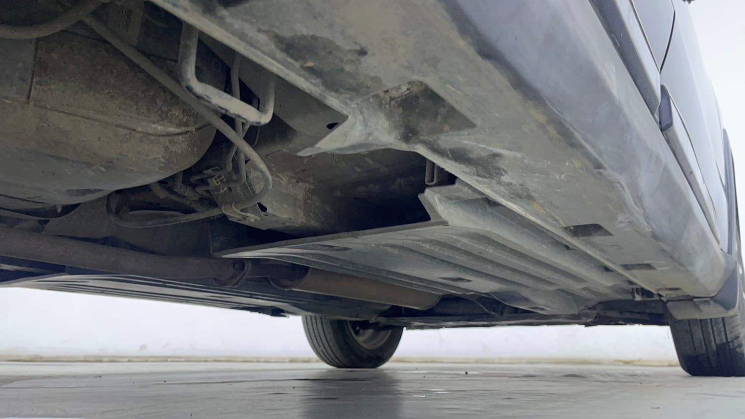 Used 2023 Maruti Suzuki Grand Vitara Alpha Smart Hybrid AT Petrol Automatic extra REAR RIGHT UNDERBODY VIEW