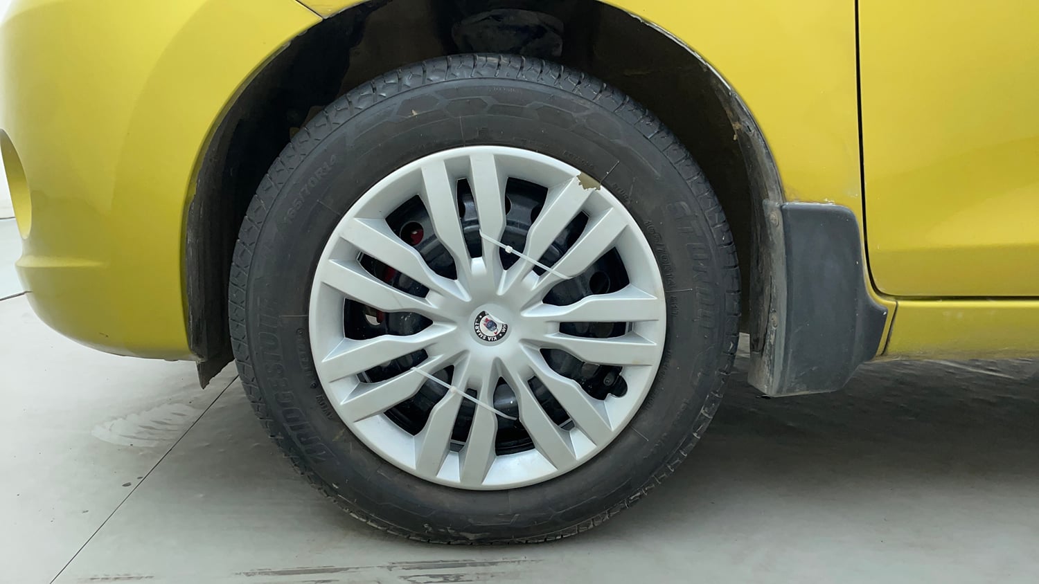 Used 2014 Maruti Suzuki Celerio VXi AMT Petrol Automatic tyres LEFT FRONT TYRE RIM VIEW