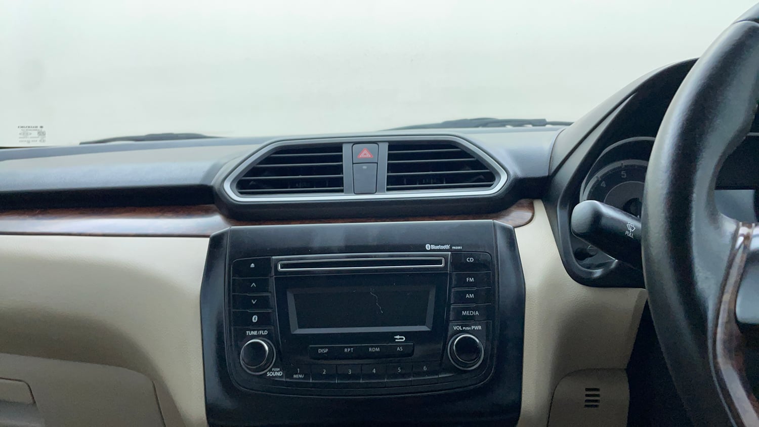 Used 2018 Maruti Suzuki Dzire ZXi Petrol Manual top_features Integrated (in-dash) music system