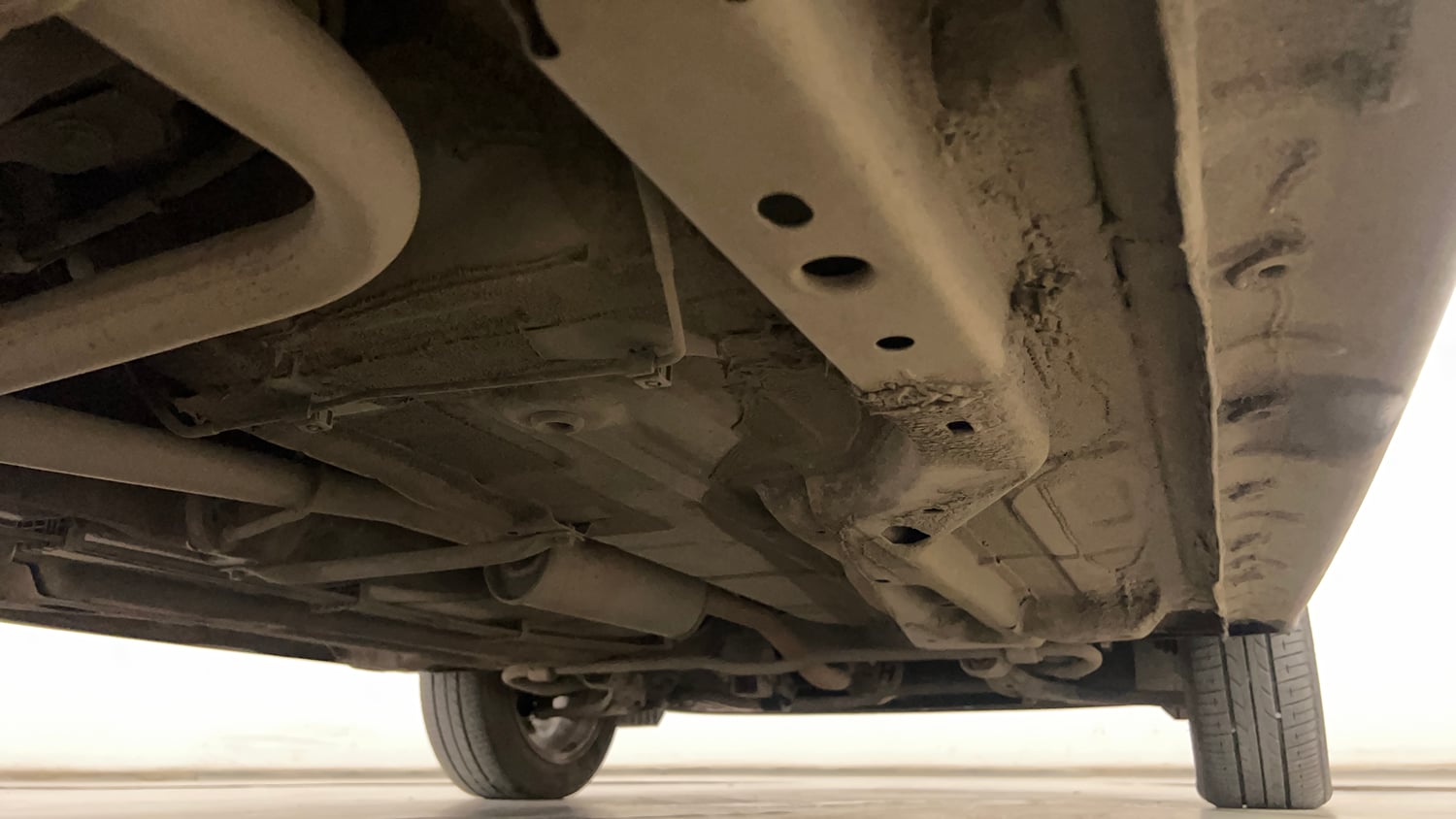 Used 2022 Tata Tigor XZ Plus Petrol Manual extra REAR RIGHT UNDERBODY VIEW