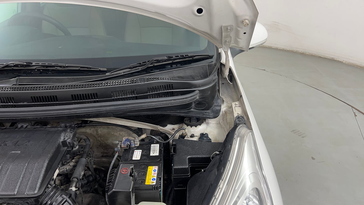 Used 2017 Hyundai Grand i10 Sportz (O) 1.2 Kappa VTVT Petrol Manual engine ENGINE LEFT SIDE HINGE & APRON VIEW