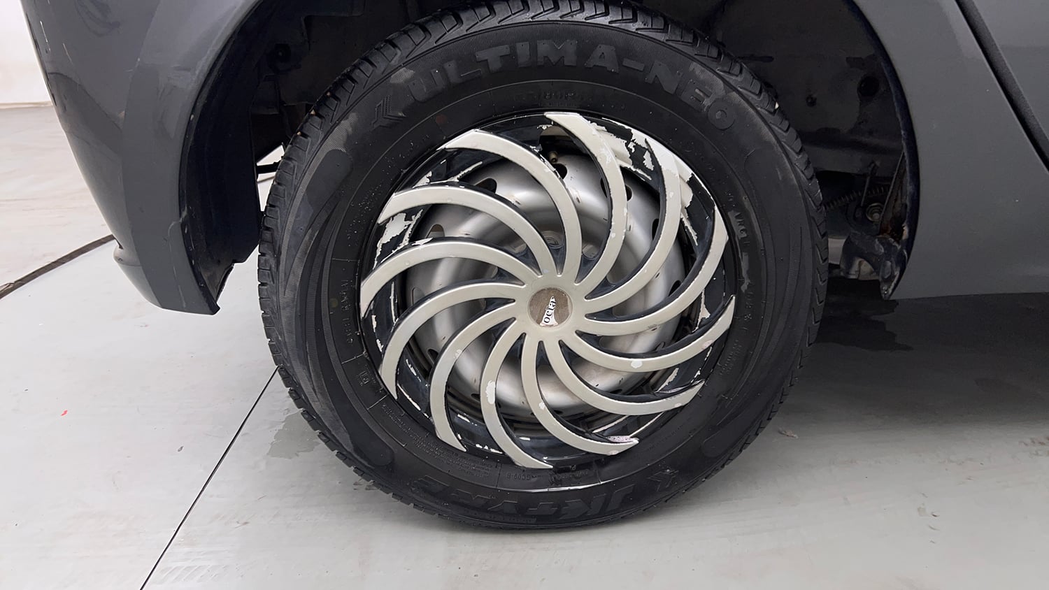 Used 2024 Tata Tiago XE Petrol Manual tyres RIGHT REAR TYRE RIM VIEW