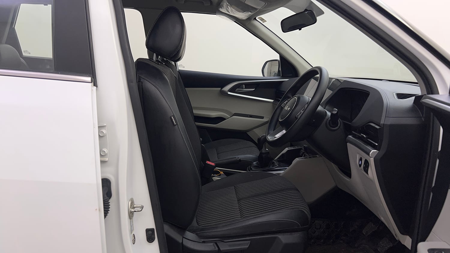 Used 2022 Kia Carens Prestige Plus 1.4 Petrol MT 7 STR Petrol Manual interior RIGHT SIDE FRONT DOOR CABIN VIEW