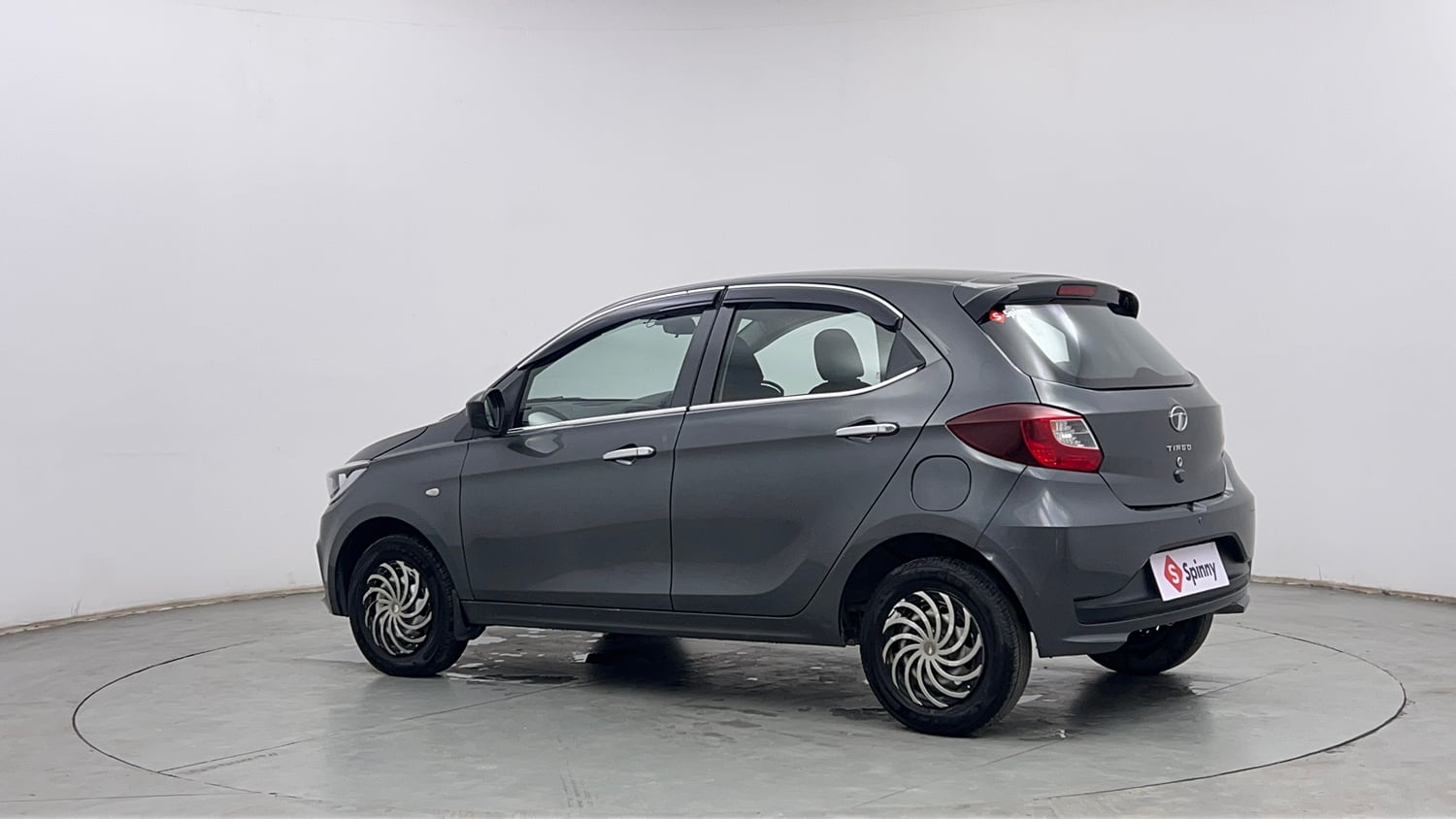 Used 2024 Tata Tiago XE Petrol Manual exterior LEFT REAR CORNER VIEW