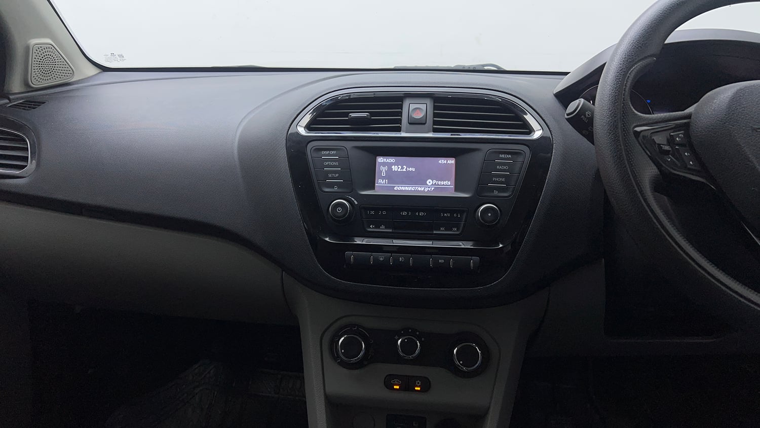Used 2019 Tata Tiago Revotron XZ w/o Alloy Petrol Manual top_features Integrated (in-dash) music system
