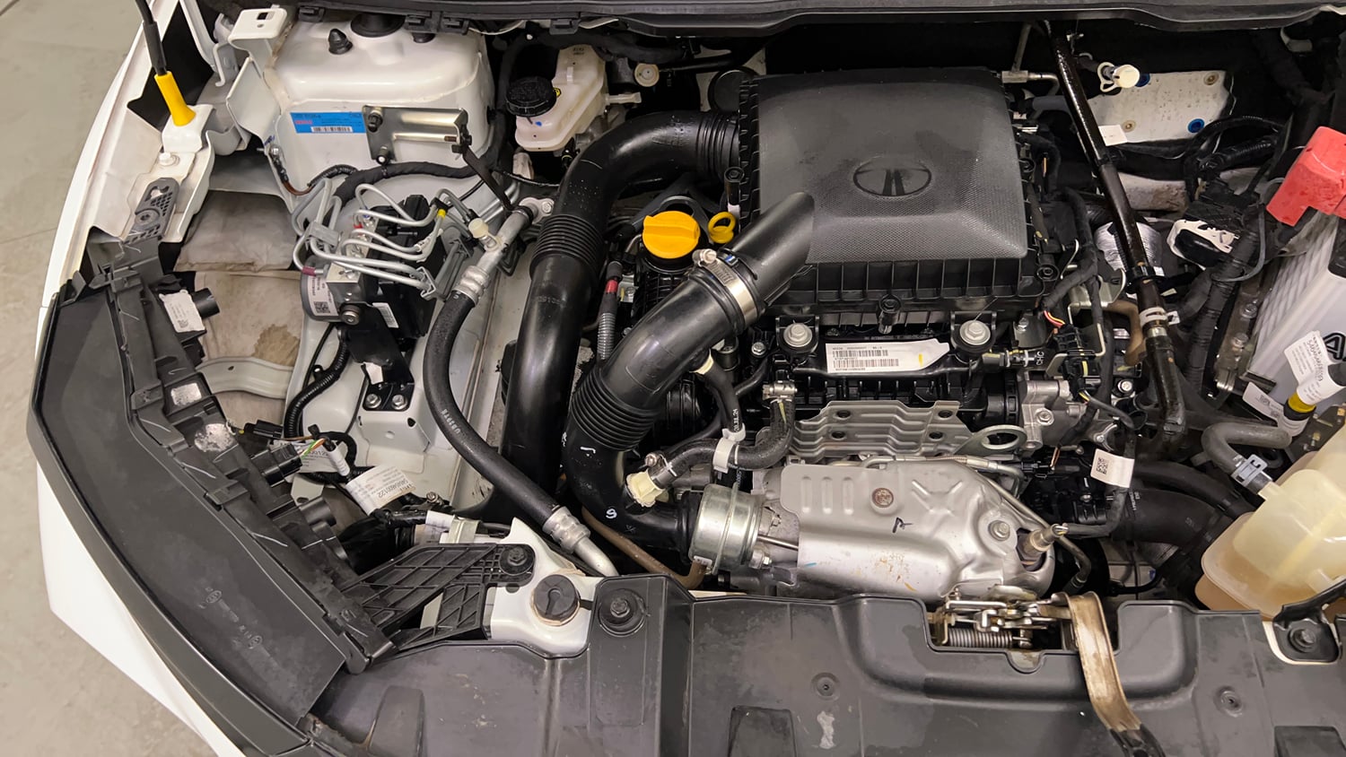 Used 2024 Tata Nexon Creative Plus S 1.2 Revotron Petrol 7DCA Petrol Automatic engine ENGINE RIGHT SIDE VIEW